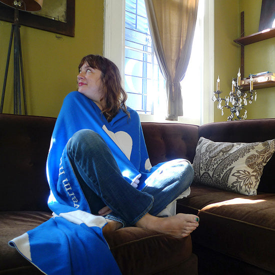 A lovely story &amp; snuggle up with our coziest *new* Eco Throw Blanket!